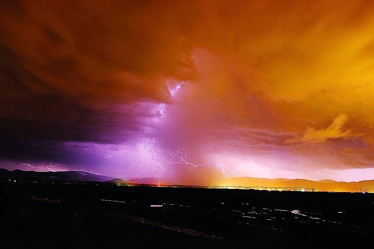 &lt;p&gt;Lightning flashes over the prairie Tuesday as a storm, bringing heavy rains, moved through the area.&lt;/p&gt;