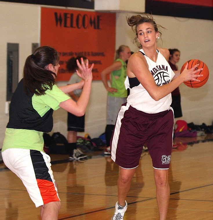 &lt;p&gt;Katie Baker of the University of Montana Lady Griz basketball team, takes part in the 3 on 3 portion of the Plains Trotters basketball camp&lt;/p&gt;