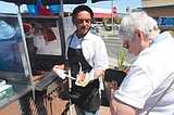 Hot dog vendor celebrates opening day