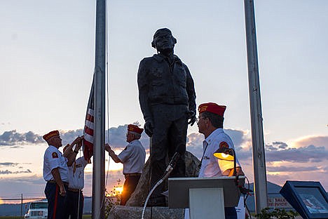 &lt;p&gt;Members of a Marine color guard lower the American flag in honor of Flag Day after the Pappy Boyington dedication on Saturday evening.&lt;/p&gt;