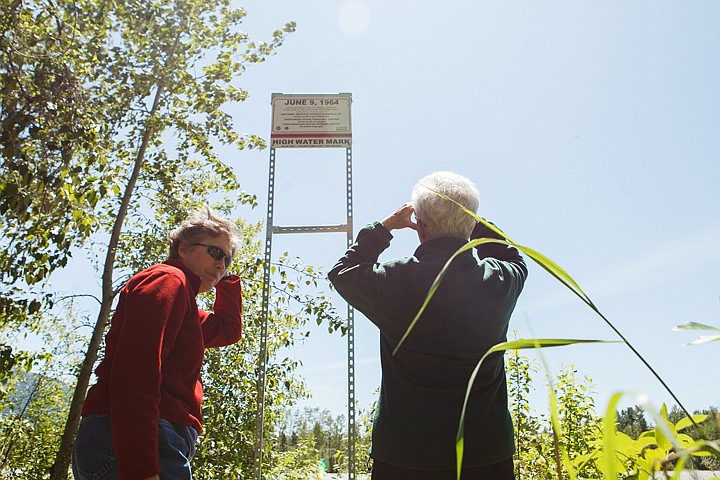 &lt;p&gt;Patrick Cote/Daily Inter Lake Luci Yates, left, and Shirley Folkwein view the new high-water mark sign Thursday afternoon during a ceremony unveiling the sign on the bank of the Flathead River in Columbia Falls. The sign marks the highest point the river reached on June 9, 1964. Yates and Folkwein are sisters and lived on Rodgers Road in Columbia Falls during the 1964 flood. Thursday, June 7, 2012 in Columbia Falls, Montana.&lt;/p&gt;