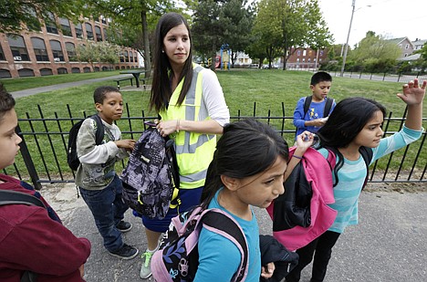 &lt;p&gt;Allyson Trenteseaux, a Walking School Bus program manager, top, in Providence, R.I. Program is seen as a way to get kids active, fight childhood obesity and improve absenteeism, which can be higher among students who live too close to school to qualify for a bus ride.&lt;/p&gt;