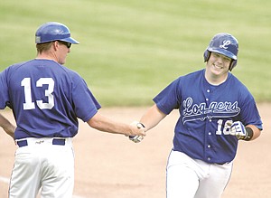 <p>Micah Germany is all smiles as he rounds third base after hitting a 2-run homer in the bottom of the second with one out to tie the game at 2. First of a doubleheader vs. Glacier B Friday evening 6-7-13.</p>