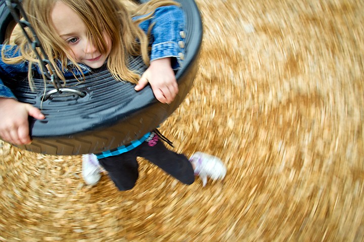 &lt;p&gt;JEROME A. POLLOS/Press Jade Miller, 6, takes a spin on a tire swing while on an outing Friday with her family to G.O. Phippeny Park in Coeur d'Alene.&lt;/p&gt;
