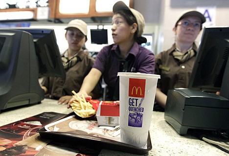 &lt;p&gt;McDonald's employees serve a meal containing a large soda Tuesday, in New York. If New York City bans big sodas, what's next? Large slices of pizza? Double-scoop ice cream cones? Tubs of movie-theater popcorn? The 16-ounce strip steak?&lt;/p&gt;