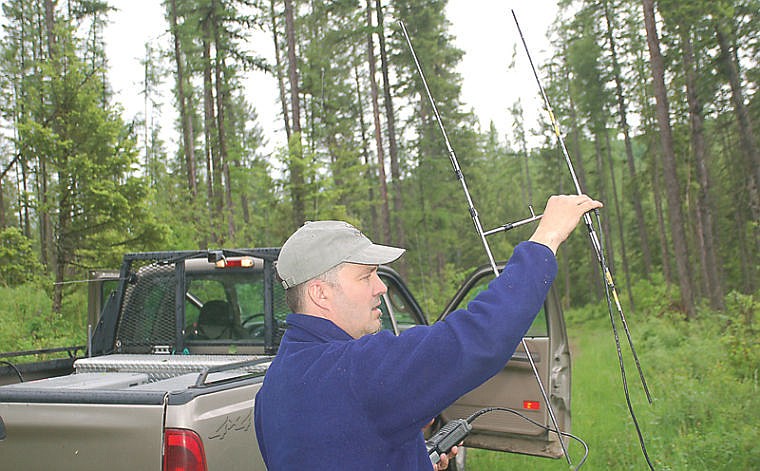 &lt;p&gt;Montana Fish, Wildlife and Parks wolf biologist Kent Laudon listens for transmitter signals from his trapline to determine if any traps have been triggered by wolves. Trapping is necessary to fit a wolf with a radio collar so a pack can be monitored.&lt;/p&gt;