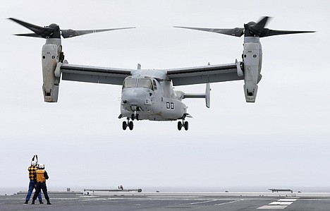 &lt;p&gt;A Marine MV-22 Osprey aircraft lands on the Japanese destroyer JS Hyuga Friday in coastal waters off San Diego. The aircraft made an unprecedented landing on the vessel Friday, despite protests in Japan over concerns over the tilt-rotor aircraft's safety record.&lt;/p&gt;