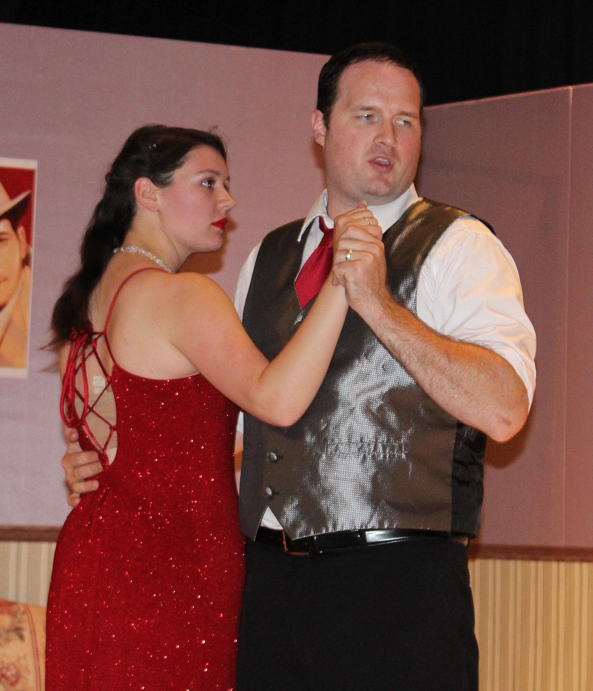 In a flashback, mysterious client Derek Canavrel (Adam Zaleski) dances with his now-missing wife Misty (Mistya Beyer) in the Masquers Theater world premiere of 'Aces are Feverish.' The play opens Friday.