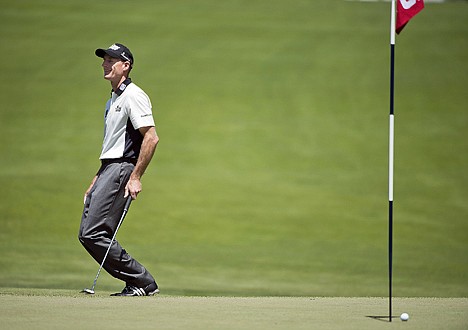 &lt;p&gt;Jim Furyk reacts after missing a putt on the fifth green during the second round of the U.S. Open on Friday at San Francisco. He is tied for the lead at 1-under par with David Toms and Tiger Woods.&lt;/p&gt;