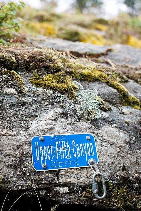 <p>A sign marks the trail to climbing areas in Q'emiln's Upper Fifth Canyon.</p>