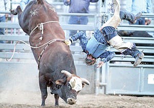 &lt;p&gt;Ian Shafer of Columbia Falls has a not-so-graceful exit from the bull known as &quot;Tom Cat&quot; during Incredi-Bull 2015 at J. Neils Park Saturday night.&lt;/p&gt;