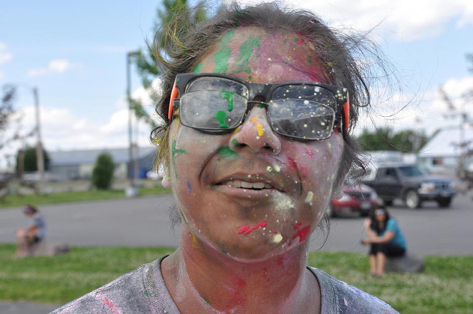 &lt;p&gt;Elliott Natz/Lake County Leader After crossing the finish line, Thomas Yellow Bird turns to his friends to cover them with paint and powder.&lt;/p&gt;