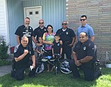 Police give boy hit by car new bike, helmet