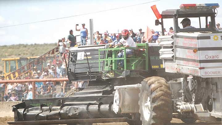 Combines collide during the 27th annual Lind Combine Demolition Derby Saturday, June 14, at the Lions Club Arena.