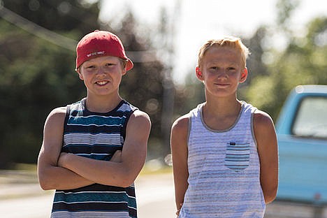 &lt;p&gt;Michael Williams, left and Zachary Enderson stand at the intersection of Third and Bay in Post Falls where they found a wallet containing credit cards, over $700 and other items. The two eleven year old boys turned the wallet into the police and it was returned to the rightful owner.&lt;/p&gt;