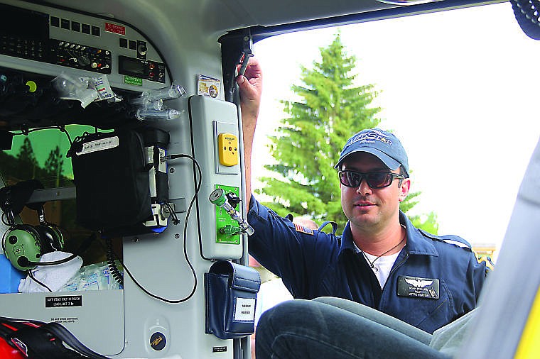 <p>MedStar Pilot Noah Phillips answers questions presented by first responders at the monthly Superior Ambulance training.</p>