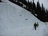 Glacier plows two miles from pass