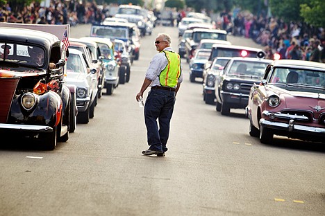 &lt;p&gt;Rick Wahl keeps an eye on the Car d'Lane cruise traffic as hundreds of cars make their way along the route through downtown Coeur d'Alene.&lt;/p&gt;