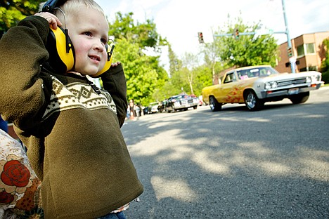 &lt;p&gt;Nate Smith, 3, makes sure his hearing protection is on tight before the onslaught of roaring classic cars roll by his vantage point at Seventh Street and Lakeside Avenue.&lt;/p&gt;