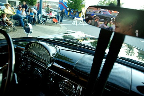 &lt;p&gt;With Hank Williams playing through the radio, Ken Smith enjoys the view of the crowd watching him cruise along Lakeside Avenue from inside his 1955 Ford.&lt;/p&gt;