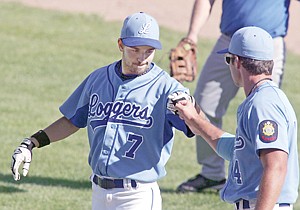 &lt;p&gt;Andrew Haggerty, left, exchanges base hit &quot;knucks&quot; with Josh Foote top of the fifth inning in Saturday's Loggers/Legends alumni game.&lt;/p&gt;