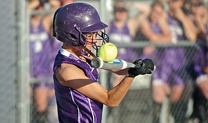 Ashley Johnson of the 16U Purple Rain makes contact with all of the ball during her team's tournament run.