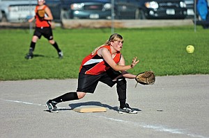 Jordyn Eichert of the 12U Ronan Orange and Black Attack gets ready to field the ball.