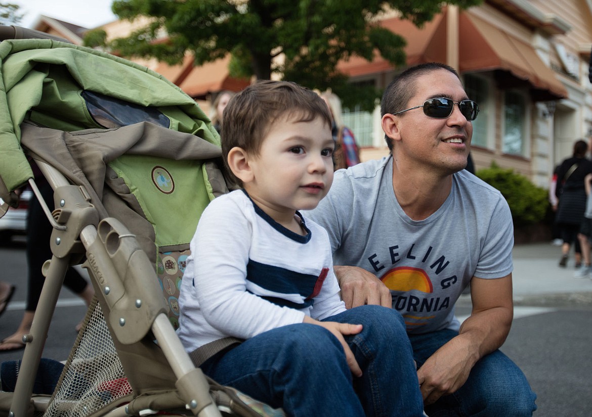 &lt;p&gt;Andy Lujan, 42, and his son Andy Jr., 2, enjoy their first Car d'Lane together.&lt;/p&gt;