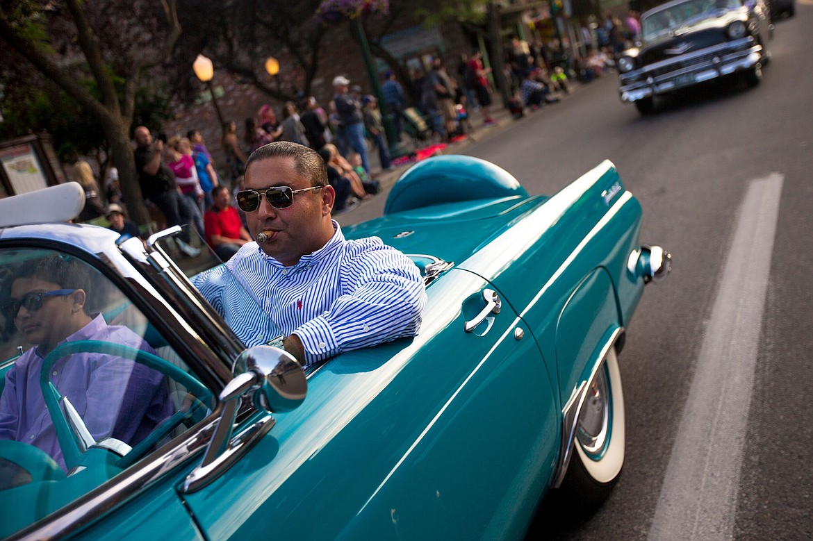 &lt;p&gt;J.J. Marks puffs a cigar as he drives his 1956 Thunderbird.&lt;/p&gt;