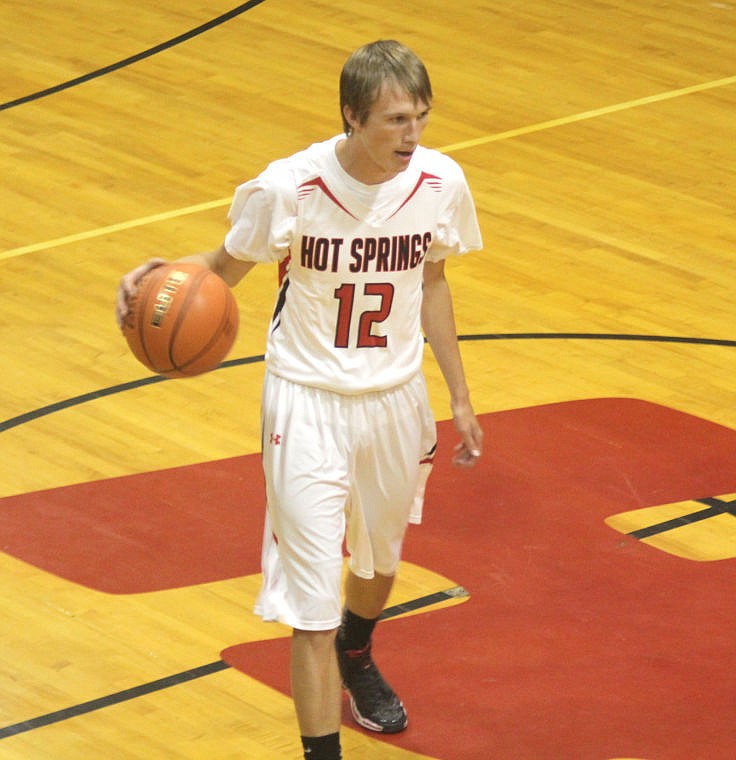 &lt;p&gt;Jimmy Holland prepares to take the ball down the court during the alumni game.&lt;/p&gt;