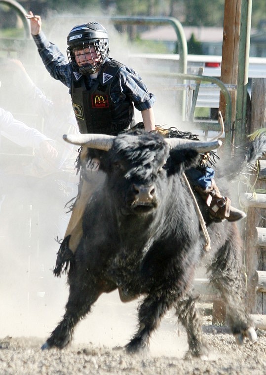 Payton Fitzpatrick of Polson competes in Miniature Bull riding.