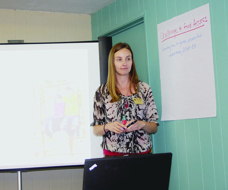 &lt;p&gt;Lorianne Burhop addresses the community members gathered at the hunger meeting.&lt;/p&gt;