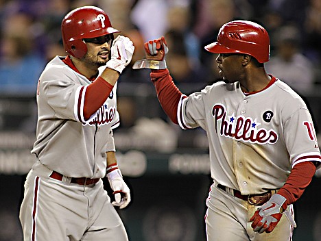 &lt;p&gt;Philadelphia&#146;s Shane Victorino, left, greets Jimmy Rollins after Victorino hit a two-run home run in the ninth inning Saturday night at Seattle. The Phillies beat the Mariners 5-1.&lt;/p&gt;