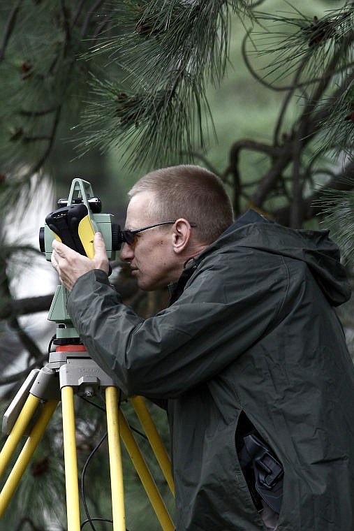 &lt;p&gt;Phil Smart of the Montana Highway Patrol uses instruments to put together a &quot;Total Station&quot; forensic map of the scene of a fatal, officer-involved shooting that took place in St. Regis on Wednesday night.&#160;&lt;/p&gt;