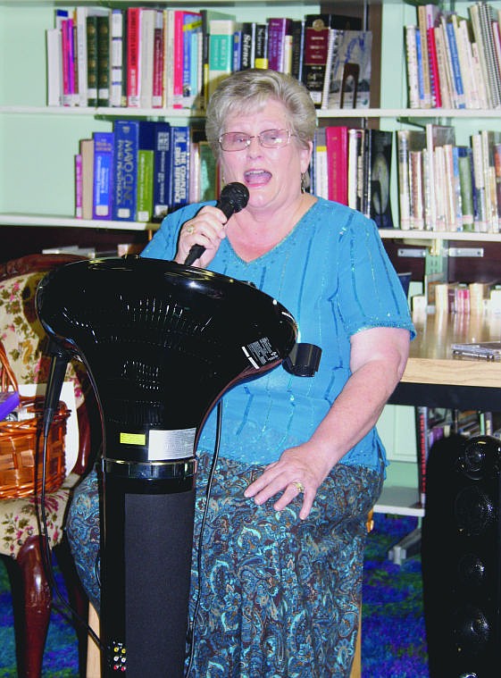 &lt;p&gt;Lynda Tarwick of Plains fills the library with the sound of music as she sang to her heart's content for an hour on Tuesday.&lt;/p&gt;