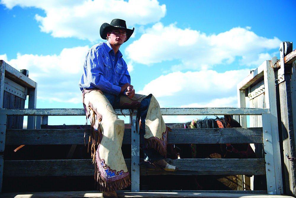 &lt;p&gt;Cowboy Dustin Morigeau of Dixon takes a break before the start of the weekend's rodeo in Hot Springs.&lt;/p&gt;