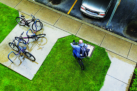 &lt;p&gt;SHAWN GUST/Press Nathan Smalley rides a new bike through the apartment complex where he lives on his way to work.&lt;/p&gt;