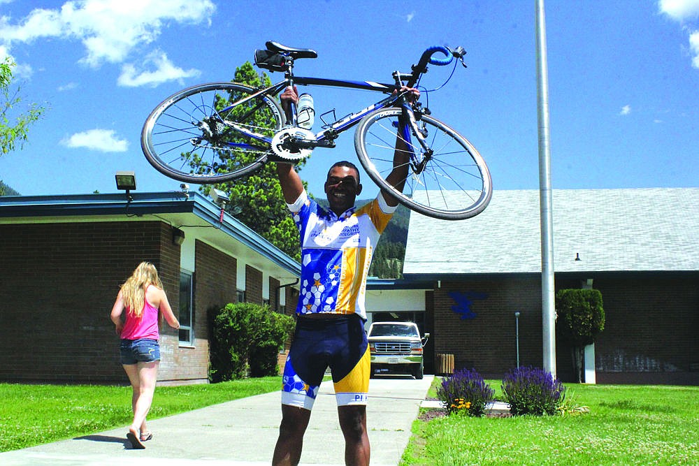 &lt;p&gt;&lt;span&gt;Desh&eacute; Gully lifts his bicycle over his head after completing the trip from Sandpoint, ID. to Thompson Falls last week.&lt;/p&gt;&lt;p&gt;&lt;/span&gt;&lt;/p&gt;