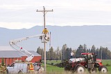 Ag sprayer takes down power line
