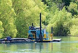 No harm from breach in cleanup pond