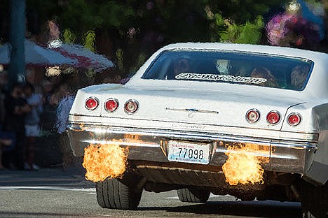 &lt;p&gt;Fire comes out of a pre-1975 Chevrolet during the Car d'Lane cruse down Sherman Ave. on Friday evening.&lt;/p&gt;