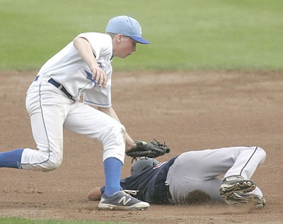&lt;p&gt;Bitterroot Bucs' Bo Zeiler gets caught in a run-down, second baseman Seth Bateman with the tag, third out top of second inning June 17.&lt;/p&gt;