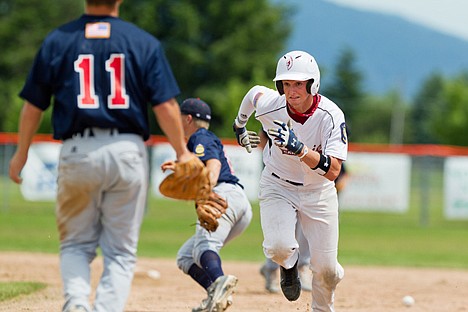 &lt;p&gt;Prairie's Tyler Shaffer races back to first base after a Twin City defender dropped the ball during a third inning run down.&lt;/p&gt;