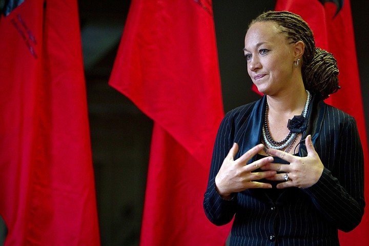 &lt;p&gt;Rachel Dolezal, director of education &amp; curator of the Human Rights Education Institute, discusses the offering of Human Rights Education Institute flags Monday in response to flags flown by local hate groups.&lt;/p&gt;