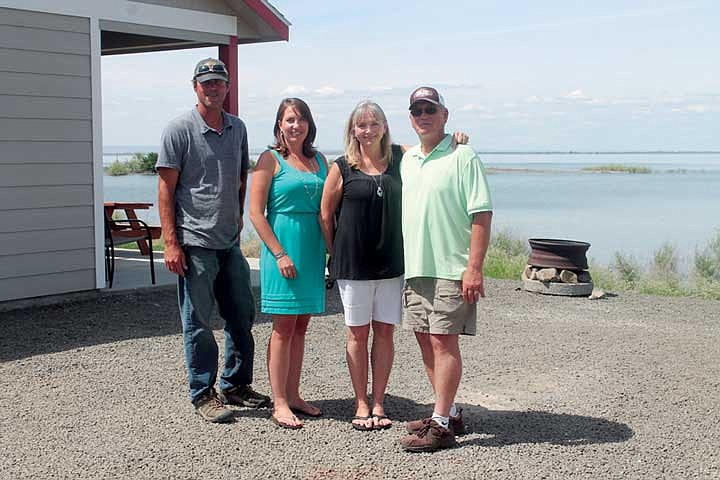 Mike and Marilyn Meseberg, right, and their children Levi Meseberg and Annie Baltzell recently celebrated the MarDon Resort's completed expansion.