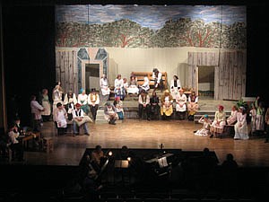Photo courtesy of Bob Bushnell
The actors get in place for the beginning of Act 2 during a dress rehersal in May.