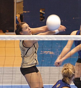 Staci Benson of Polson High School digs a ball out for the Pirates at the Class A Stae Volleyball tournament.