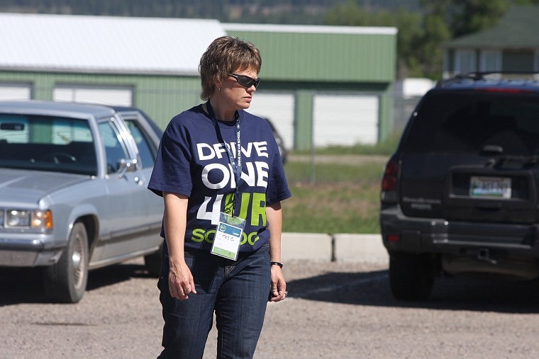 Pete Whittenburg helps people test drive cars in order to raise money for schools throughout the county.