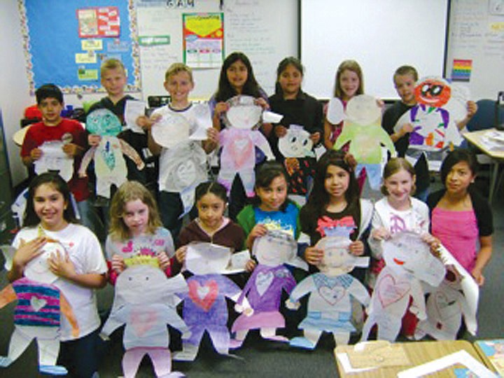 Sheila Ziegler's third grade class at Red Rock Elementary in Royal City has so many students (32) that it takes two photos to get them all in with their &#147;bigger than life&#148; characters. As a culminating enrichment project for a reading program, each student chose a favorite book's character on which to report. These characters were on display around the third grade hallway for all to enjoy.
