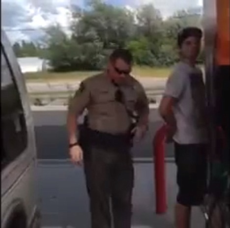 &lt;p&gt;In this still from a YouTube video, a Kootenai County sheriff's deputy handcuffs an unidentified male during a June 20 incident. At the center of the confrontation between officers and two males is a potential misunderstanding between &quot;Nickelback&quot; and &quot;nickel sack.&quot;&lt;/p&gt;